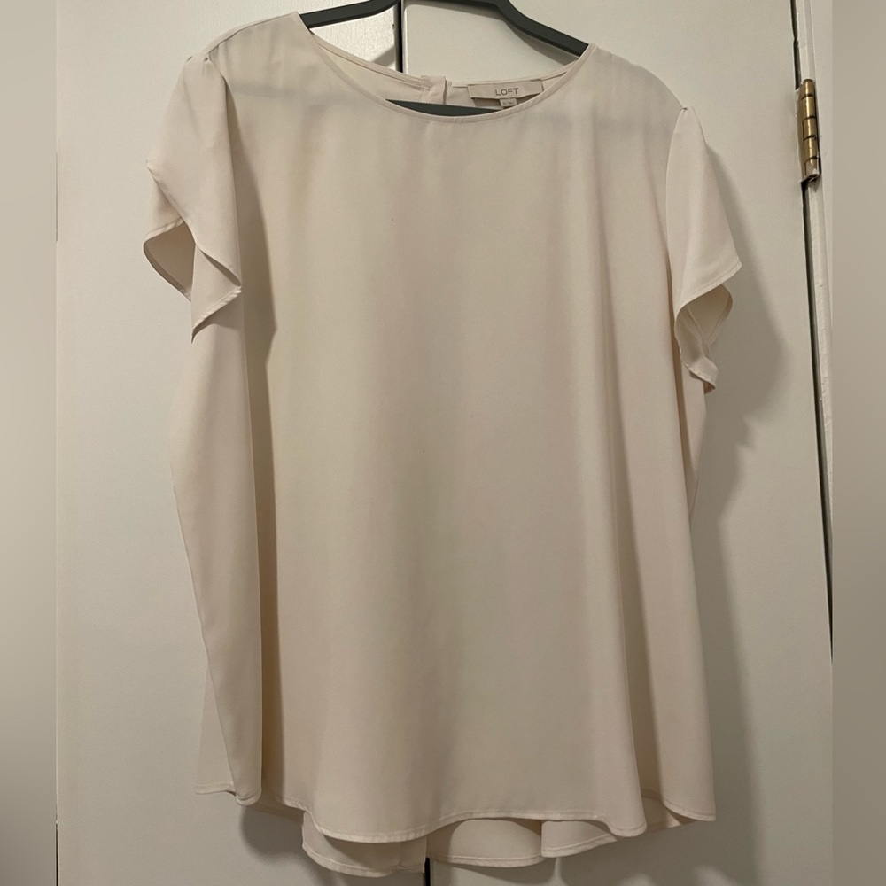 Cream color short sleeve button-back blouse